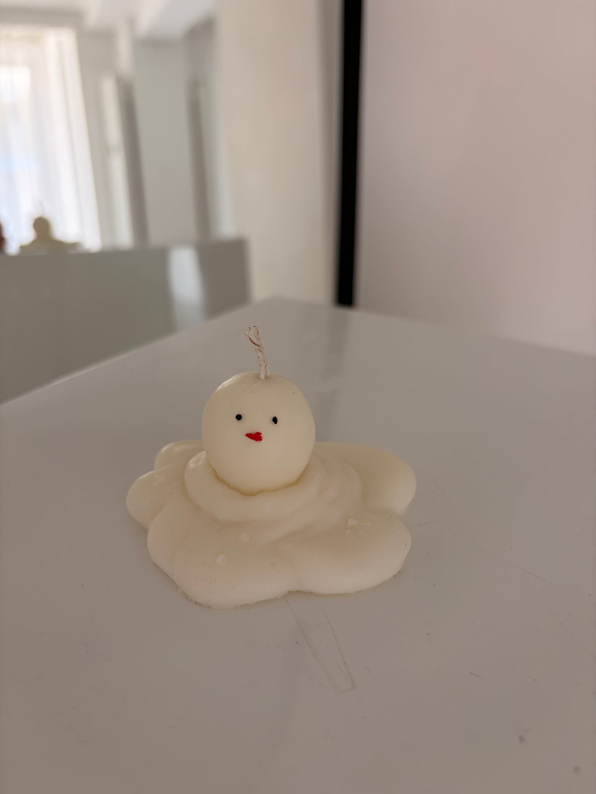 Geschmolzener Schneemann Kerze