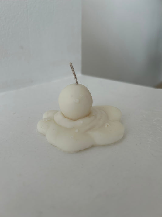 Geschmolzener Schneemann Kerze