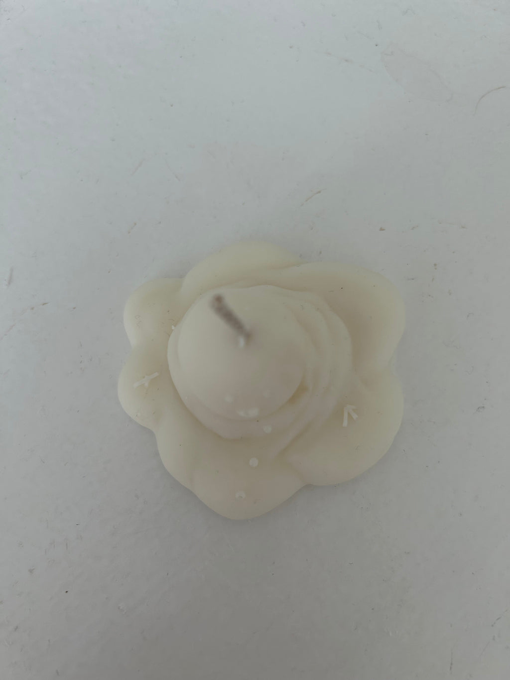 Geschmolzener Schneemann Kerze