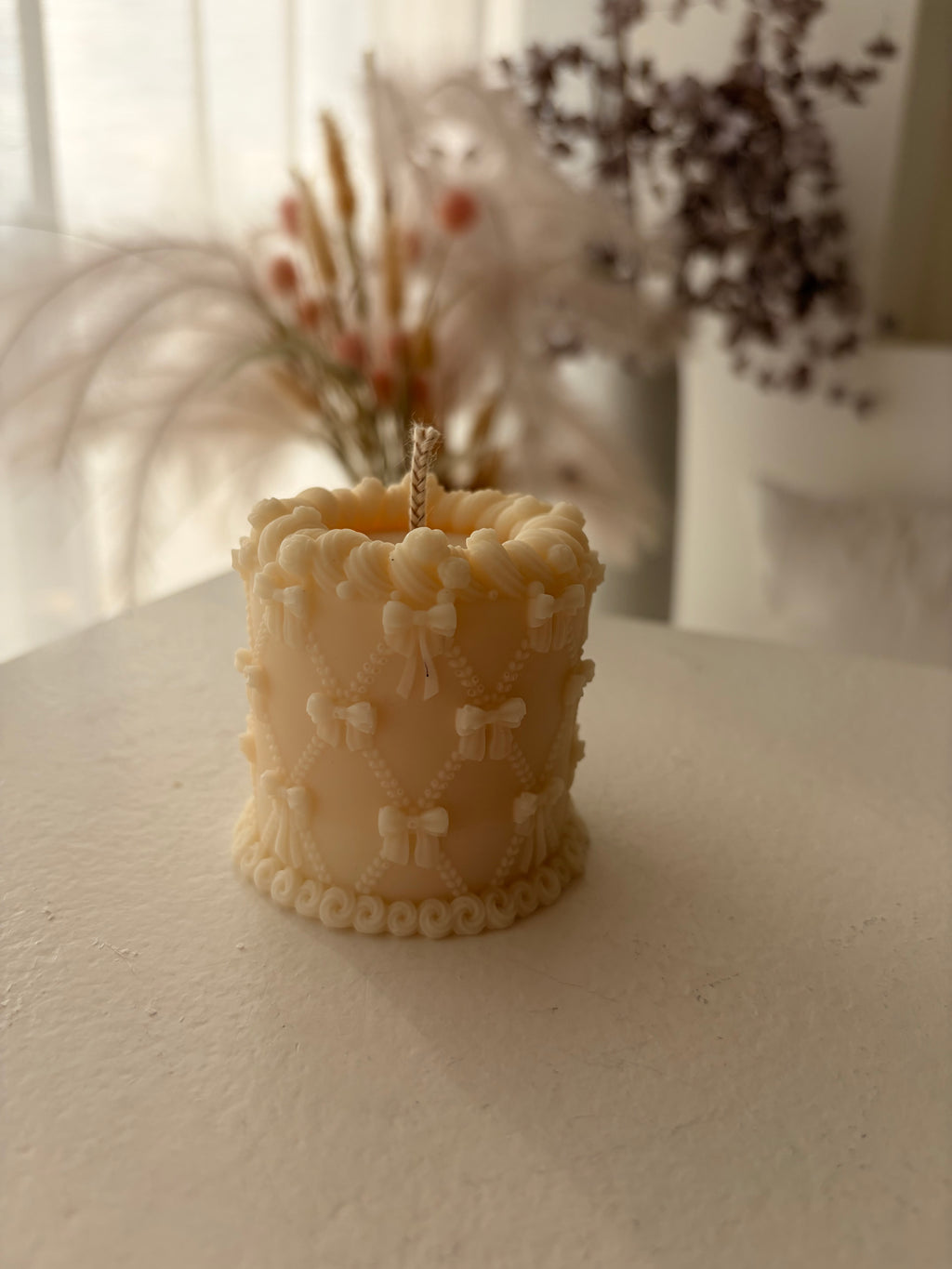 Tortenkerze mit Schleifen